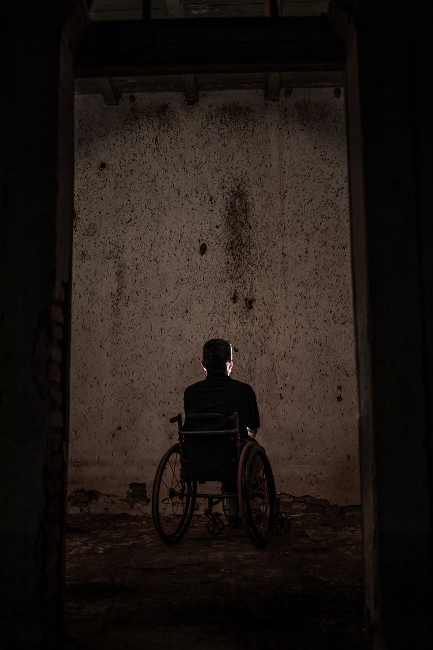 man sitting on a wheelchair