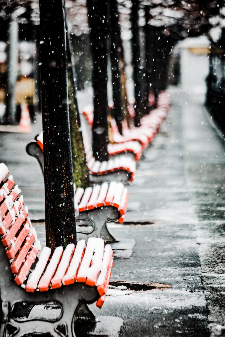 chairs covered in snow